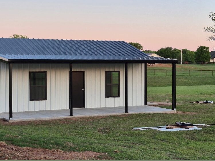 brown and black wooden house on green grass field during daytime